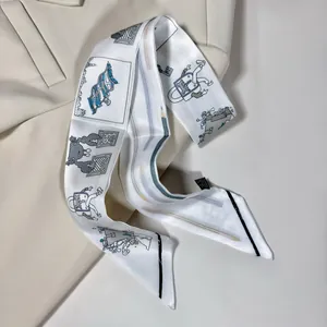 Elegant long skinny scarf with hand-painted handbag and key patterns on a beige suit