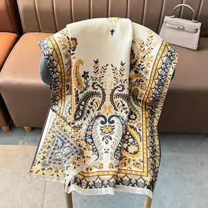 Thick paisley jacquard cashmere scarf in navy and yellow with fine fringe tassels