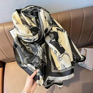 Luxury black and white wool scarf with artistic equestrian print and fringe edges
