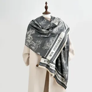 Detail of soft landscape painting cashmere-feel scarf with tassels and chic text design
