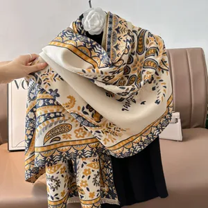 Thick cashmere-like shawl with yellow and navy blue paisley floral pattern