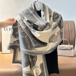 Artistic horse pattern scarf with soft frayed edges on a decorative hanger