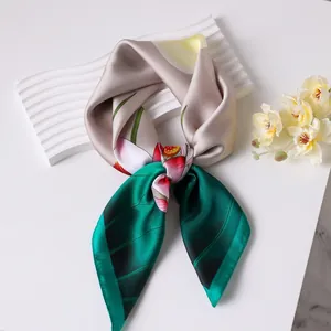 Elegant 70cm silk square scarf featuring traditional lotus prints and premium satin finish