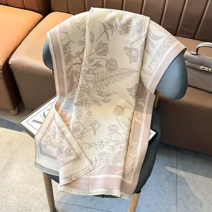 Elegant beige floral cashmere-like shawl with vintage patterns and tassel fringe detail
