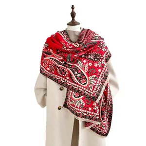 Thick cashmere-like shawl with red paisley pattern and fringe details for winter