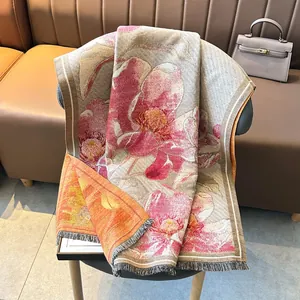 Sciarpa invernale effetto cashmere con fiori a olio e bordo arancione con nappe