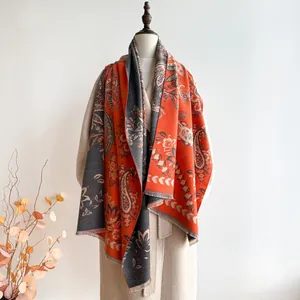 Detail of paisley pattern on reversible thick pashmina shawl with tassel edge