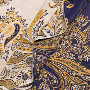 Close-up of double-sided paisley jacquard shawl showing contrast colors and weave texture
