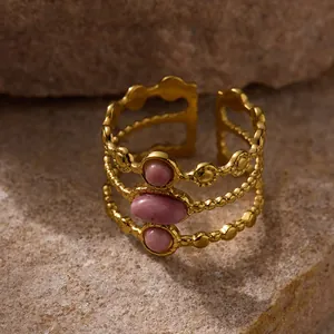 Adjustable 18K gold-plated stainless steel ring with three pink gemstones and beaded layers
