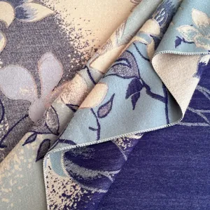 Detail shot of the elegant jacquard floral texture and thick cashmere-like fabric