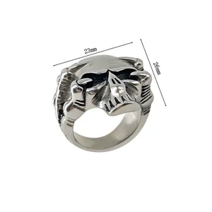 Detailed view of punk skull ring in silver-black finish with 23mm width dimensions