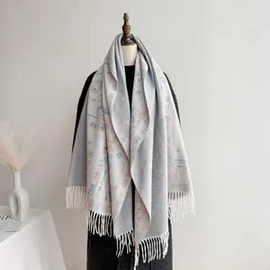 Bohemian paisley jacquard shawl in light blue with elegant tassels for autumn winter