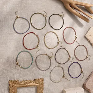 Set di 12 bracciali tennis colorati con zirconi a fila singola e catene placcate oro 18K