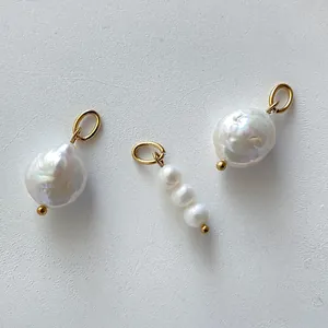 Baroque freshwater pearl and gold stainless steel pendants in various artistic designs