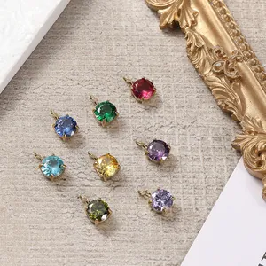 Detailed view of 14K gold plated round zircon pendants in eight vibrant assorted colors