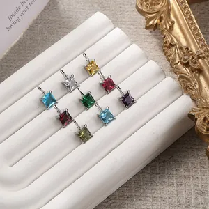 Square colored gemstone pendants in stainless steel settings shown in nine vibrant colors