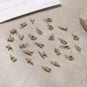 Full set of 26 crystal-encrusted gold letter pendants for personalized jewelry DIY