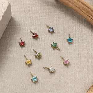 Star-shaped stainless steel charms with colorful crystals and gold metal plating