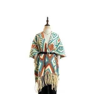 Bohemian geometric knit shawl with fringes in light blue and orange for autumn and winter