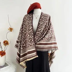 Elegant leopard print poncho shawl for women with fringe trim and retro autumn style