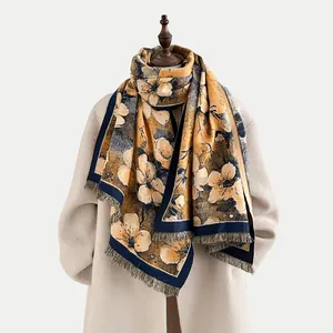 Detail of floral vintage oil painting scarf with tassel edge on beige coat