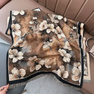 Close-up of winter vintage floral shawl showing cashmere texture and tassel fringe
