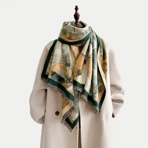 Detailed texture of thick oil painting style scarf with decorative fringe tassels