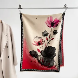 Detail of winter scarf with pink floral ink painting and soft cashmere-like texture