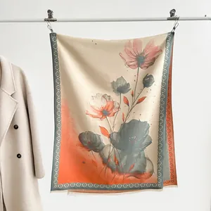 Detail of silk-like scarf featuring orange flower ink painting and fringe edges