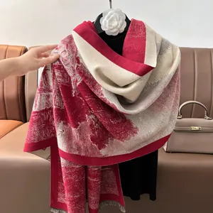 Thick faux cashmere scarf with ink wash landscape pattern and fringed edges