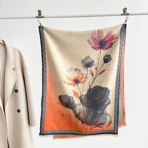 Detail of floral printed pashmina shawl with watercolor lotus and heart pattern border