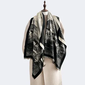 Detail of vintage landscape print scarf with tassels for autumn winter warmth