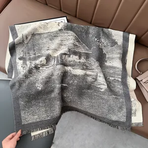 Detailed texture of thick cashmere-like scarf with grey ink landscape pattern on a sofa