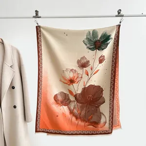 Macro detail of faux cashmere shawl featuring ink painting lotus and floral gradient patterns