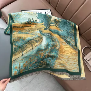 Close-up of thick oil painting print shawl with fringe details on a leather sofa