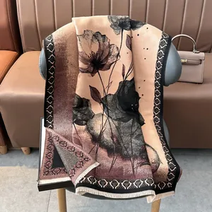 Detailed view of winter cashmere-like shawl with lotus ink painting and tassel edges
