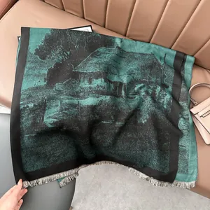 Detail of artistic landscape oil painting pattern and cream tassels on cashmere scarf
