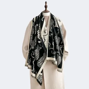 Detailed view of cat print cashmere scarf with wave patterns and delicate fringe edges