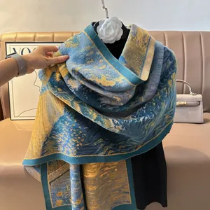 Detail showing high-end oil painting print texture on thick blue and gold cashmere scarf