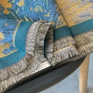 Close-up of oil painting print cashmere scarf with heavy weave and fringe edges