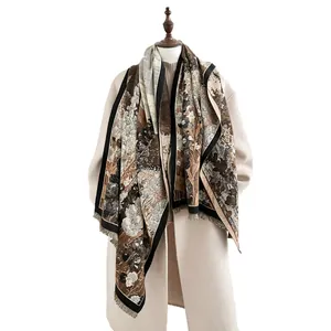 Floral print faux cashmere scarf with tassels and earth-tone landscape pattern for winter
