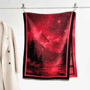 Detail of red and black landscape print cashmere shawl with elegant fringe and pine tree pattern