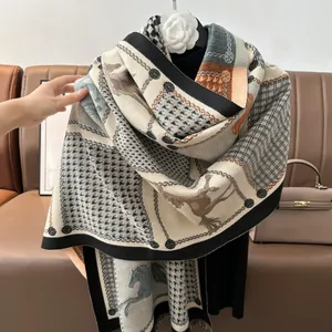 Detail of multi-pattern scarf with horse motif and white camellia flower decoration