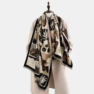 Winter faux cashmere scarf with abstract artistic plant patterns and soft fringe detail
