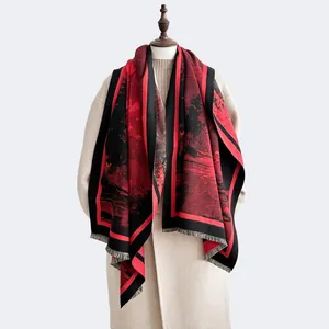 Close-up of red and black landscape jacquard scarf with tassels on a coat