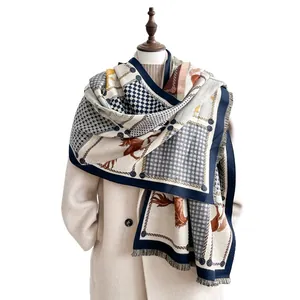 Winter horse pattern scarf with contrast navy borders and tassels on beige cashmere