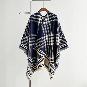 Women's plaid cashmere poncho shawl with tassel fringe in navy blue and cream
