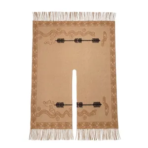 Camel faux cashmere knit poncho shawl with ethnic patterns and fringe detail