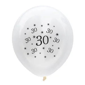 Detail of 12-inch white latex balloon featuring black number 30 and star pattern