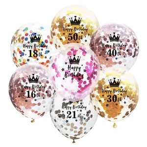 Macro shot of assorted birthday balloons with colorful confetti and age 16-50 crown motifs